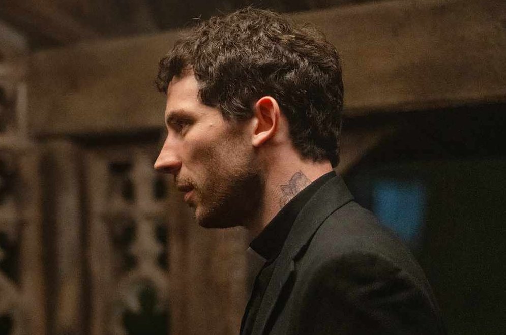 Josh O'Connor's neck tattoo in Wake Up Dead Man A Knives Out Mystery